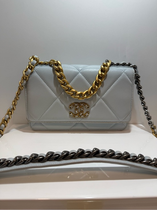 CHANEL Handbags - Chanel Light Blue Lambskin Wallet on Chain Crossbody Bag